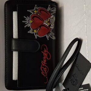 Ed Hardy black wallet/wristlet with heart and love design zipper closure.